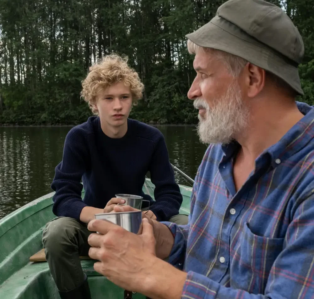 family-grandpaandboyonsmallboat